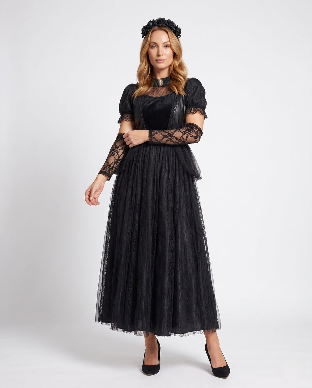 Woman wearing black gothic lace Halloween costume dress with cameo collar, velvet bodice and tulle skirt