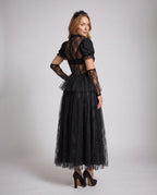 Woman wearing black gothic lace Halloween costume dress with cameo collar, velvet bodice and tulle skirt - view 4