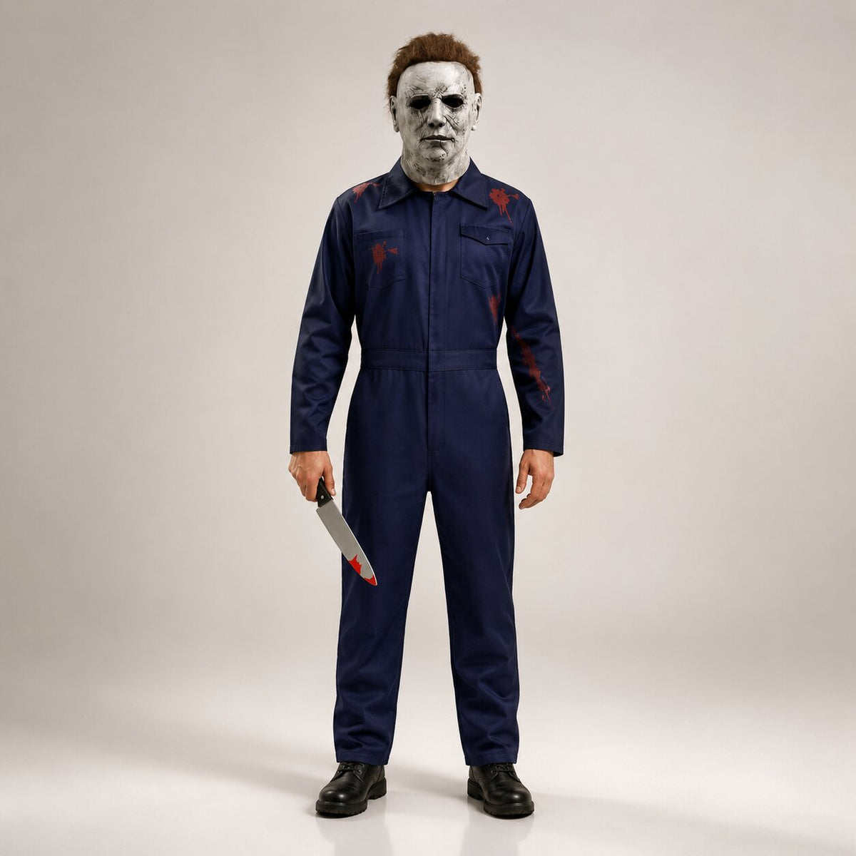 Easy horror Halloween costume set with navy coverall, full-head mask and prop knife