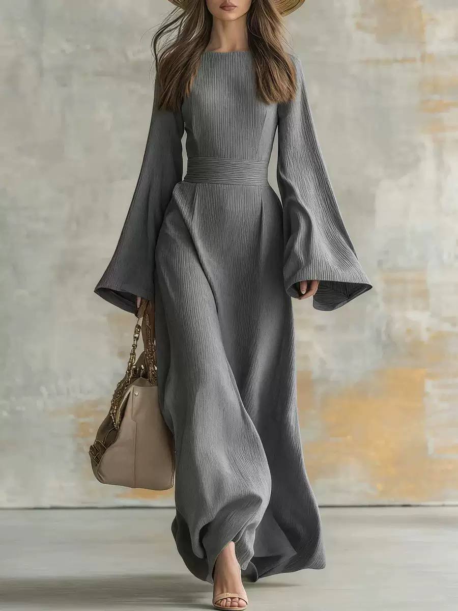 Long sleeve dress with bell cuffs and floor-length skirt in textured fabric
