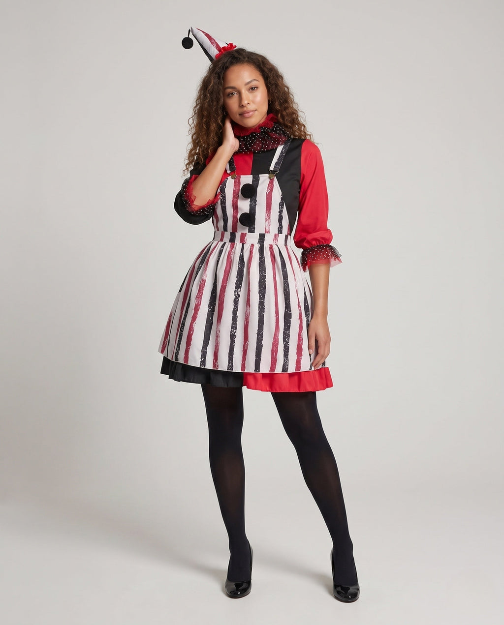 Women's clown Halloween costume with red and black striped pinafore, polka dot ruffle collar and long sleeves