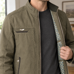 Men's stand collar jacket worn open showing geometric patterned lining - view 2