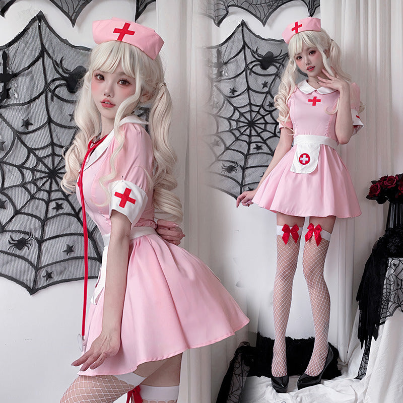 Women's pink nurse Halloween costume with white collar, apron and red cross details