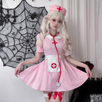 Women's pink nurse Halloween costume with white collar, apron and red cross details - view 2