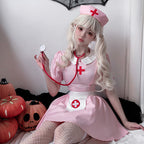 Women's pink nurse Halloween costume with white collar, apron and red cross details - view 3