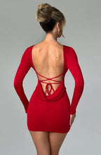 Long sleeve bodycon mini dress with boat neckline and lace-up open back - view 16