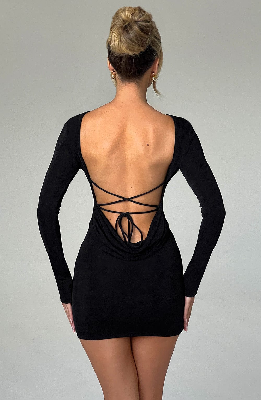 Long sleeve bodycon mini dress with boat neckline and lace-up open back - view 2