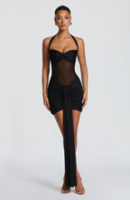Black halter mesh homecoming mini dress with ruched skirt and long front drape
