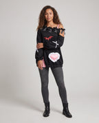 Black cold-shoulder Halloween sweatshirt with satin bows, red bat prints and pink ruffled heart