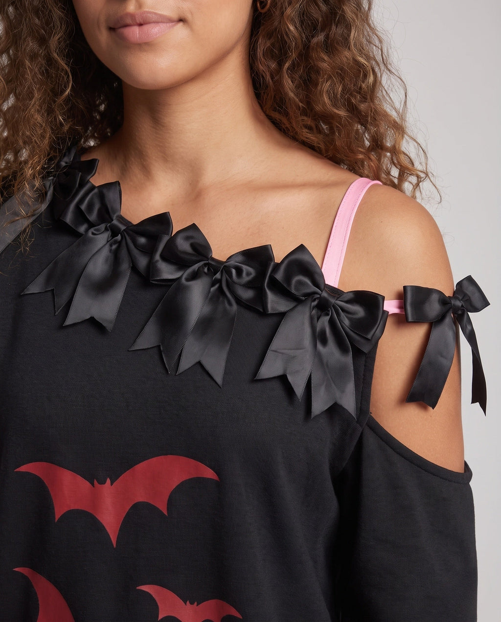 Black cold-shoulder Halloween sweatshirt with satin bows, red bat prints and pink ruffled heart - view 3