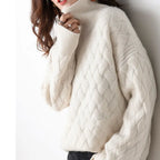 Women's lattice knit turtleneck sweater with ribbed high neck and relaxed fit