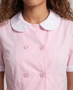 Women's pink nurse Halloween costume dress with white Peter Pan collar and pleated mini skirt - view 2