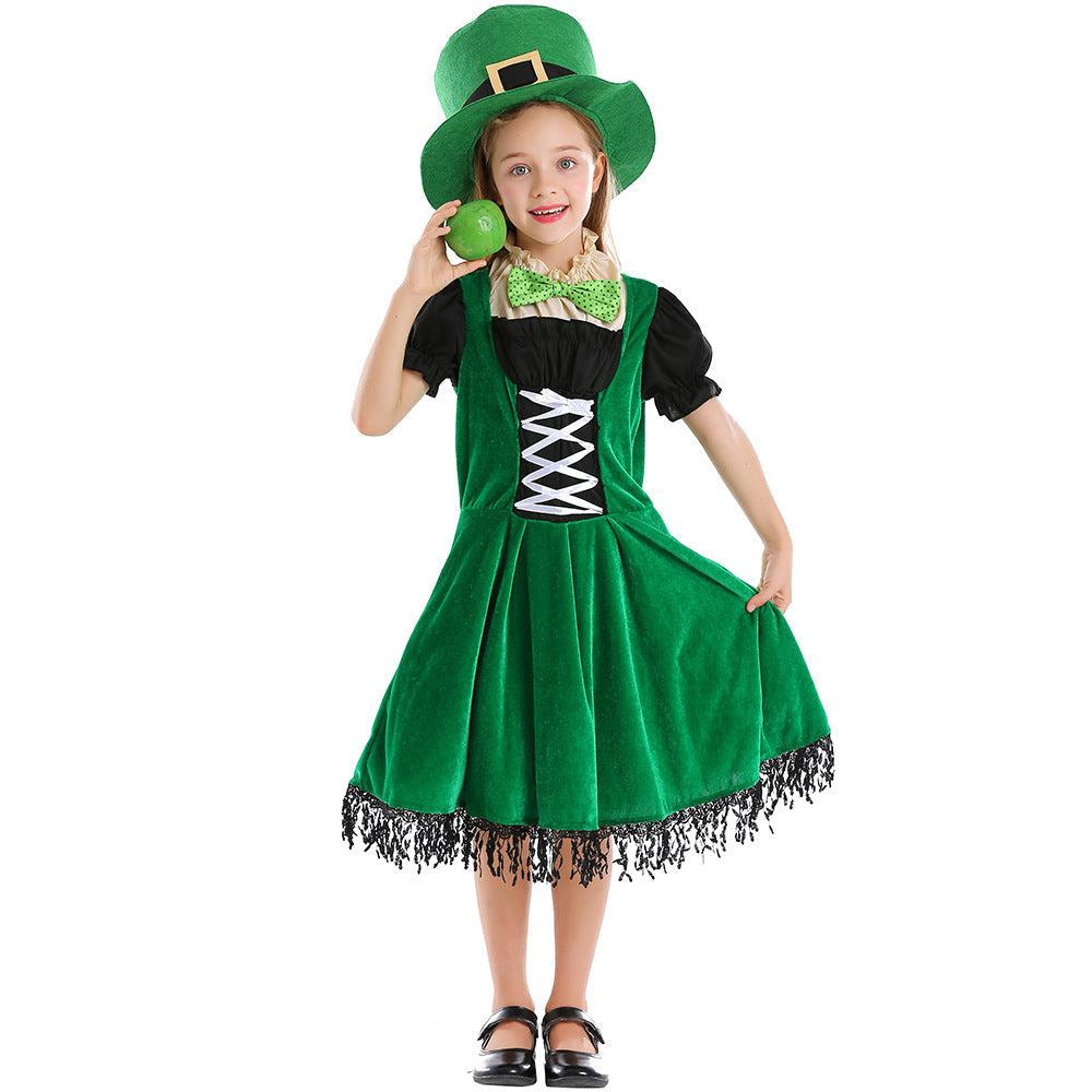 Girl wearing green velvet-look leprechaun costume dress with lace-up front, puff sleeves, fringe hem and green top hat