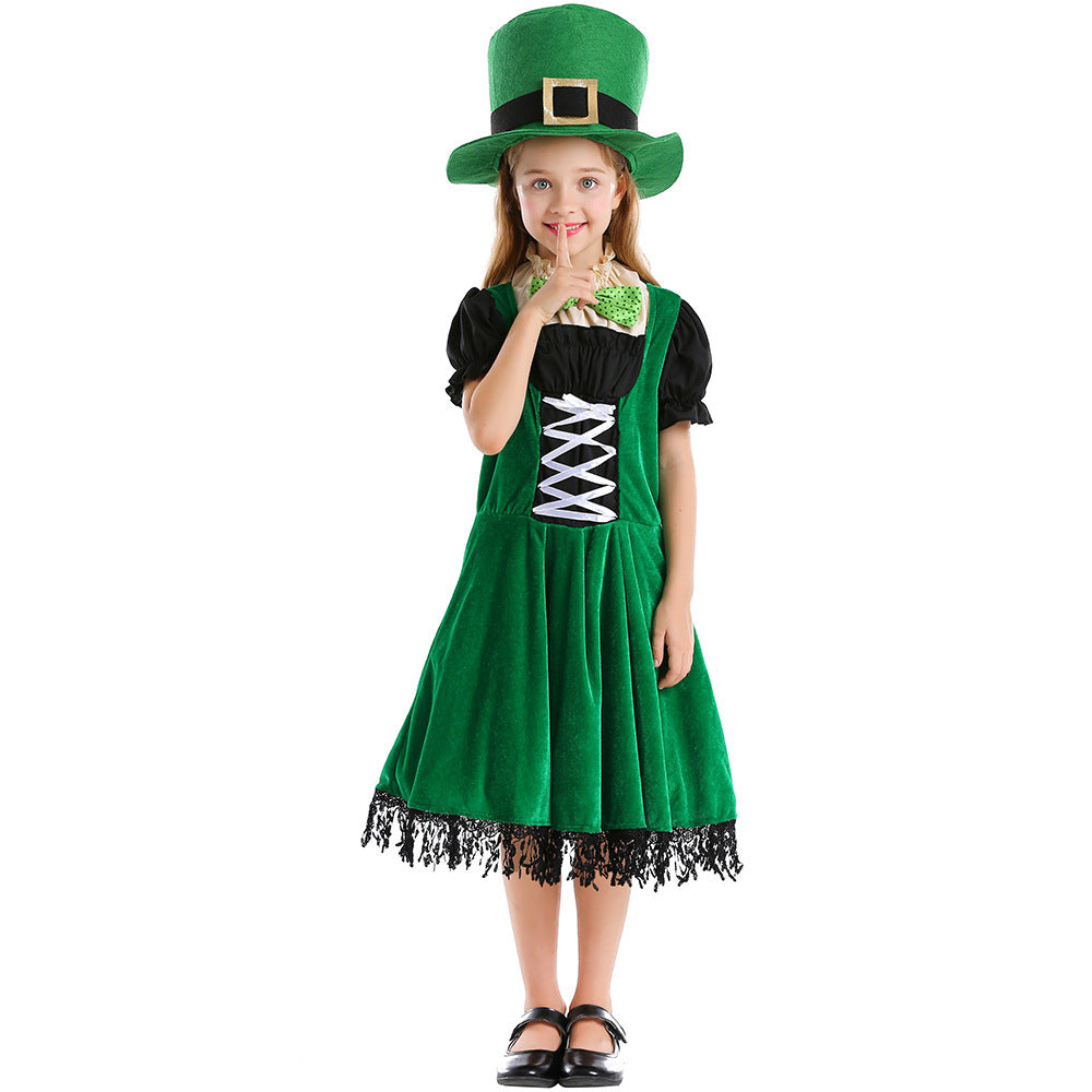 Girl wearing green velvet-look leprechaun costume dress with lace-up front, puff sleeves, fringe hem and green top hat - view 2