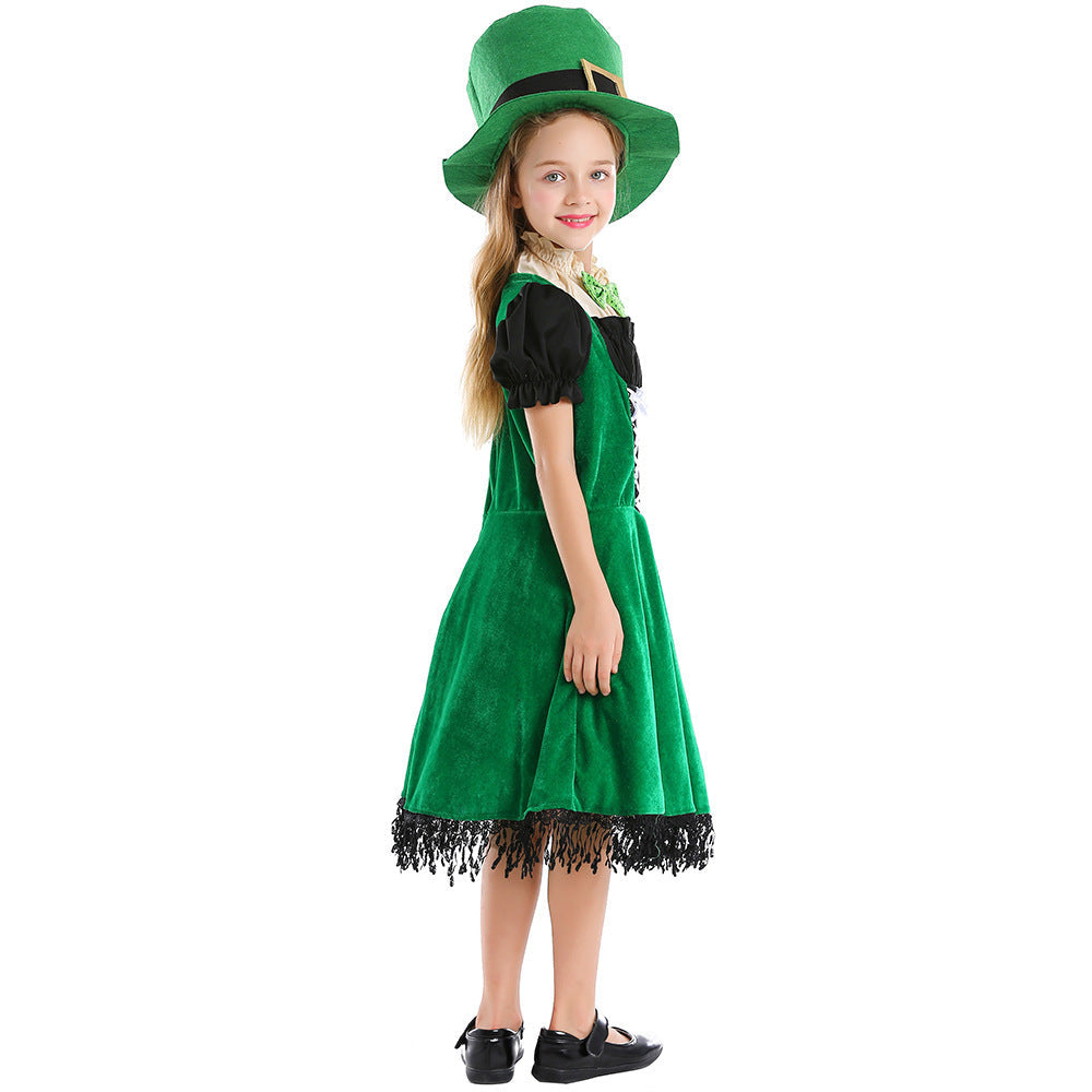 Girl wearing green velvet-look leprechaun costume dress with lace-up front, puff sleeves, fringe hem and green top hat - view 3