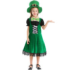 Girl wearing green velvet-look leprechaun costume dress with lace-up front, puff sleeves, fringe hem and green top hat - view 5
