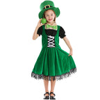 Girl wearing green velvet-look leprechaun costume dress with lace-up front, puff sleeves, fringe hem and green top hat - view 6