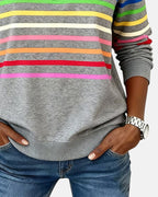 Rainbow striped quarter zip sweater with mock neck and long sleeves, women's relaxed pullover worn with jeans - view 9