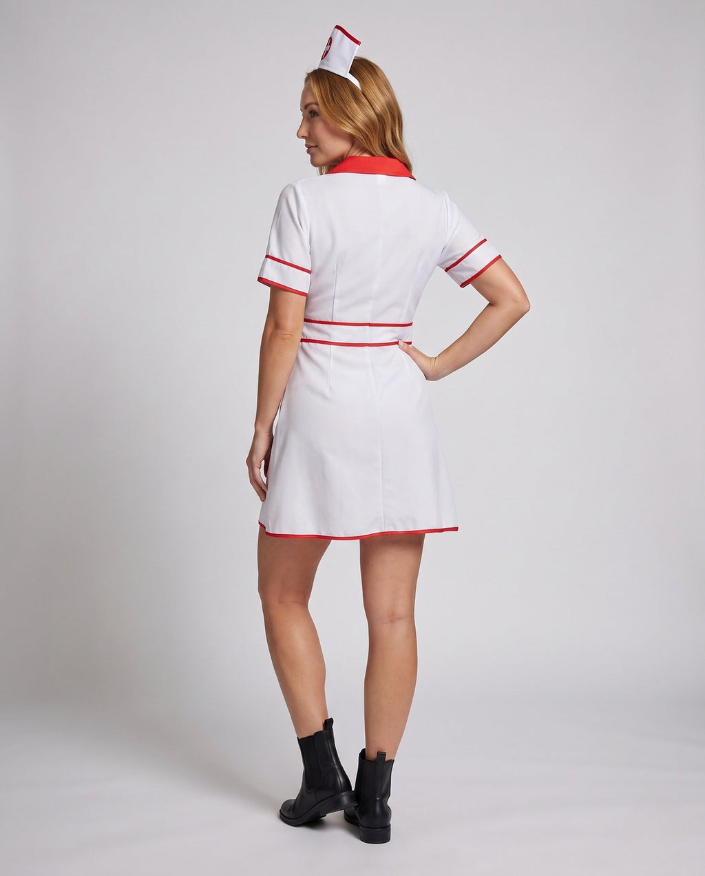 Women's white nurse costume mini dress with red lapels, red piping, front zipper and matching cap - view 3