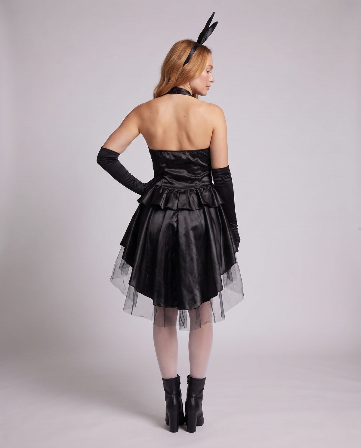 Women's bunny Halloween costume with tuxedo-front satin halter dress, ruffled skirt, tulle overlay and bunny-ear headband - view 3