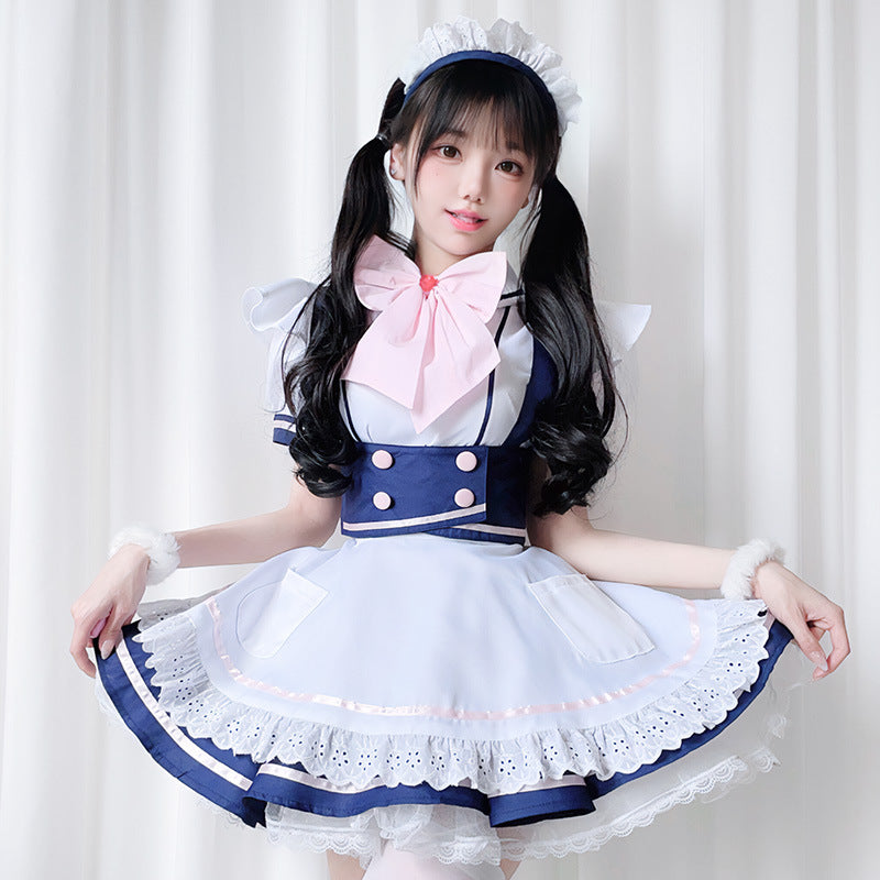 Women's navy and white maid Halloween costume dress with pink bow and lace apron