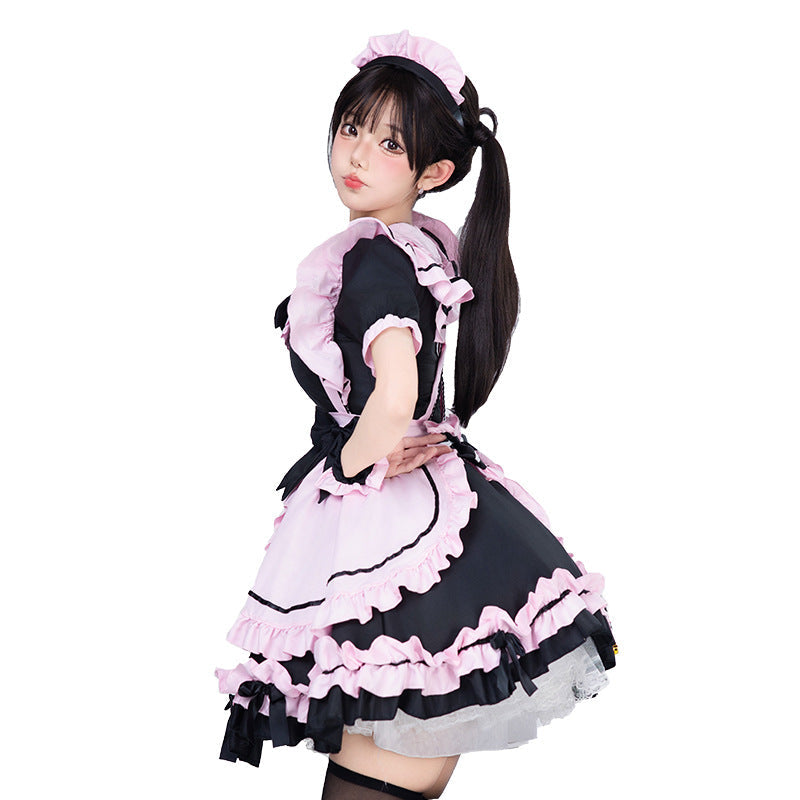 Black and pink ruffled maid Halloween costume dress with apron and bows - view 3