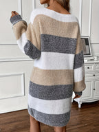 Woman wearing an oversized white, taupe and gray striped sweater dress with balloon sleeves - view 2
