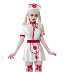 Women's white nurse Halloween costume mini dress with red trim, heart apron and matching nurse cap - view 5