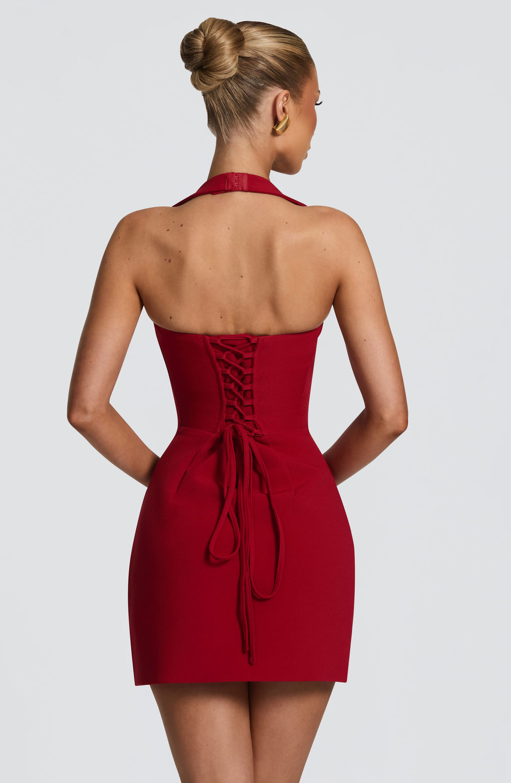 Strapless fitted mini dress with halter strap and lace-up corset back - view 2