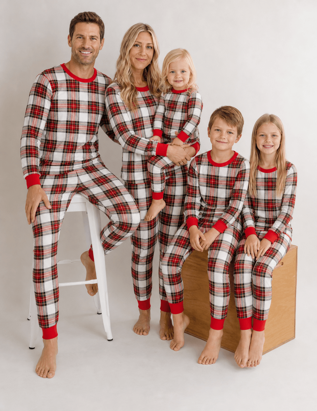 Matching red and white plaid family Christmas pajamas with red ribbed cuffs - view 3