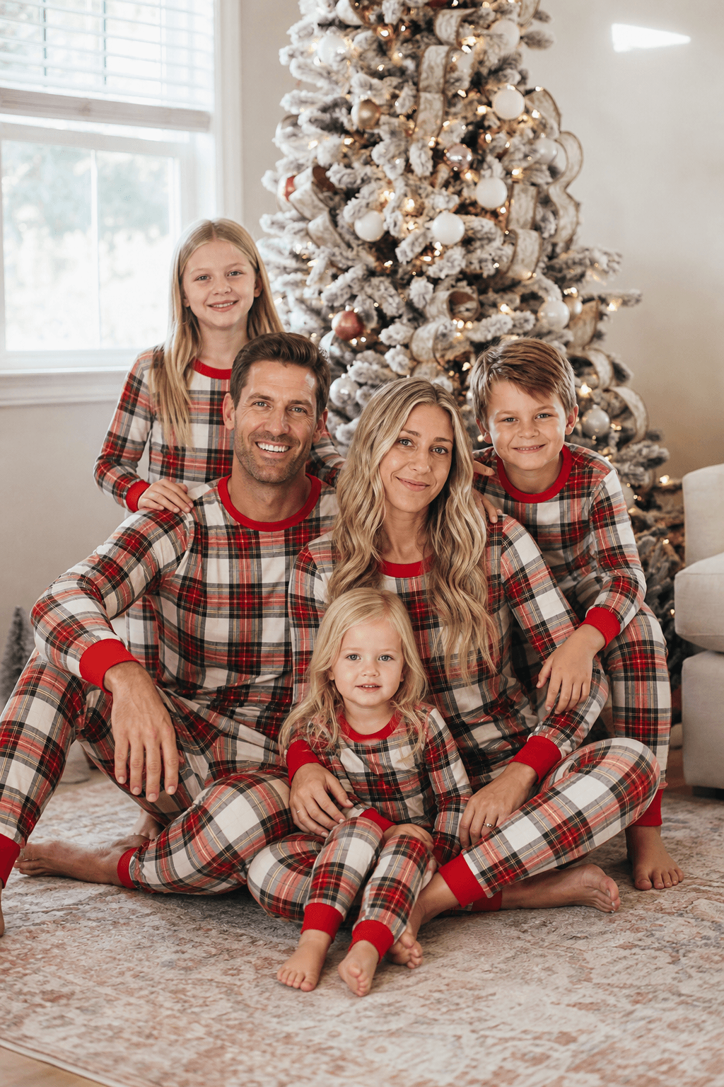 Matching red and white plaid family Christmas pajamas with red ribbed cuffs - view 5