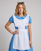 Woman wearing a blue fairytale costume dress with a white ruffled apron and Peter Pan collar - view 2