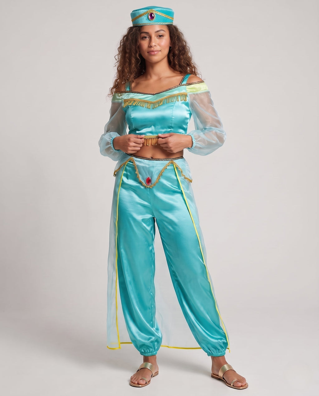 Women's turquoise satin princess Halloween costume with sheer puff sleeves, fringed crop top and harem pants