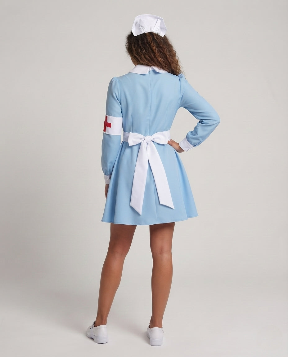 Women's light blue nurse costume with white apron, nurse cap and red cross armband - view 3