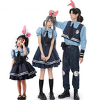 Bunny police officer costume with plush ears, blue collared top, tie, badge and navy ruffle dress or vest and pants