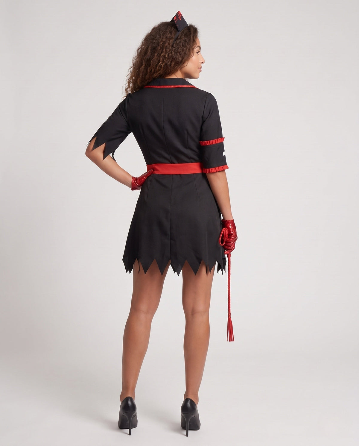Women's bloody nurse Halloween costume, black dress with red trim, splatter-print apron and jagged hem - view 3
