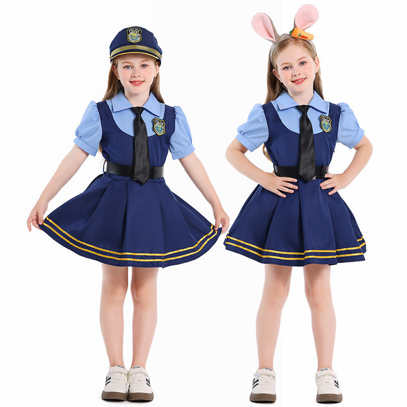 Girl wearing navy police costume dress with light blue puff sleeves, black tie, belt and gold-striped pleated skirt