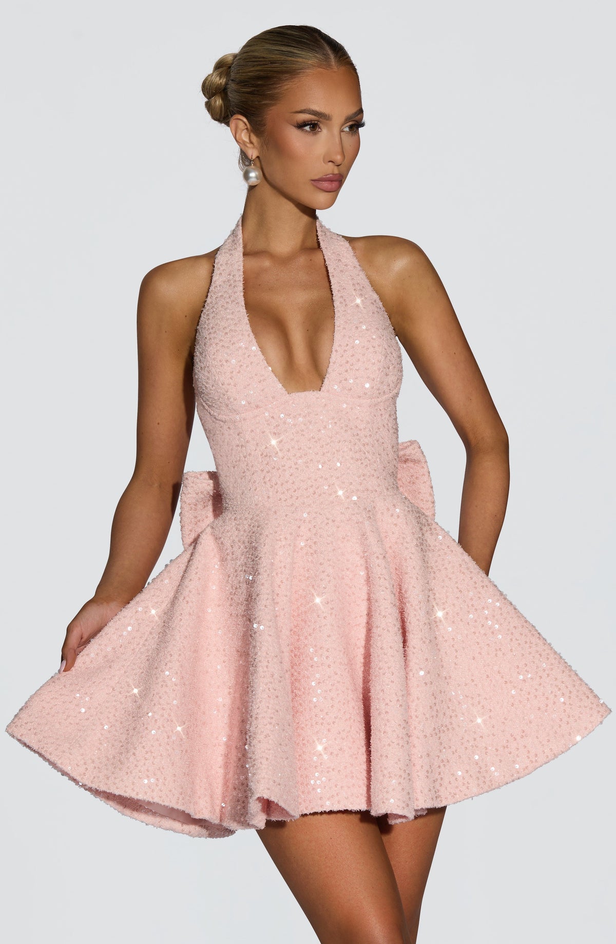 Pink sequin halter homecoming mini dress with oversized back bow - view 4