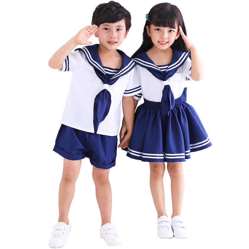 Girls' sailor Halloween costume with white top, navy striped sailor collar and navy swing skirt