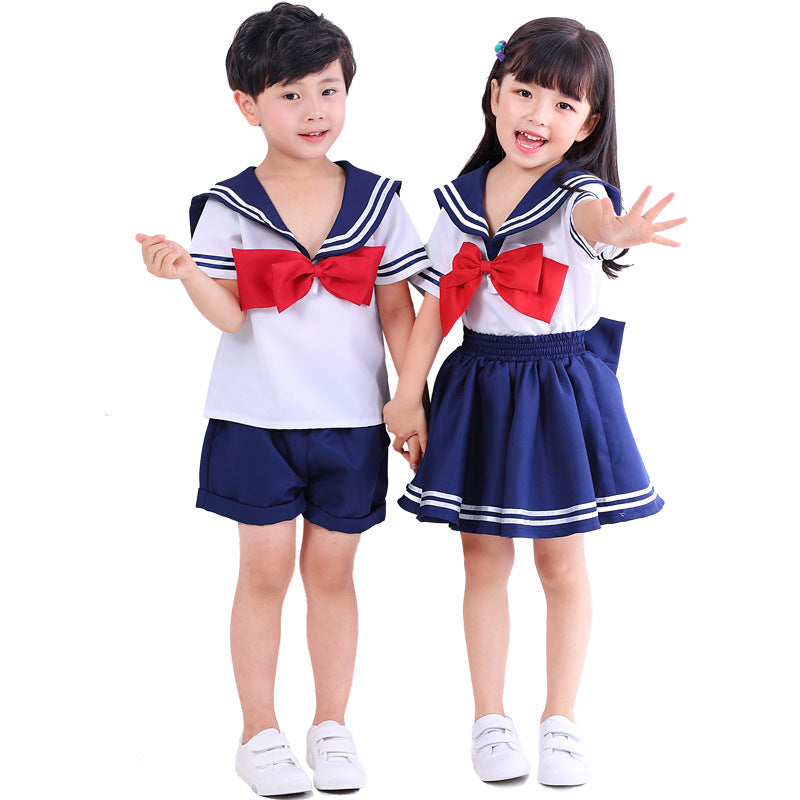 Girls' sailor Halloween costume with white top, navy striped sailor collar and navy swing skirt - view 2