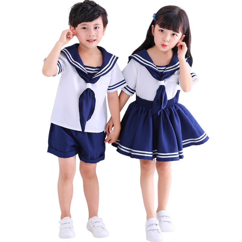 Girls' sailor Halloween costume with white top, navy striped sailor collar and navy swing skirt - view 3