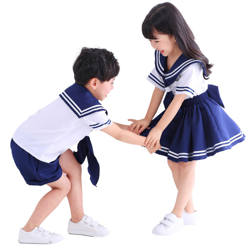 Girls' sailor Halloween costume with white top, navy striped sailor collar and navy swing skirt - view 4