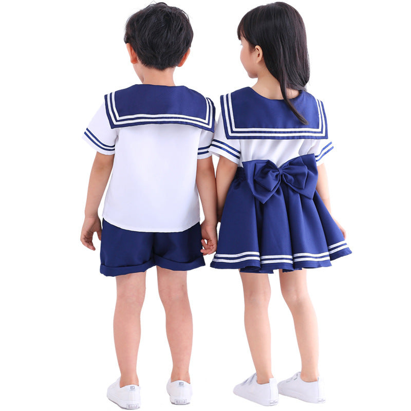 Girls' sailor Halloween costume with white top, navy striped sailor collar and navy swing skirt - view 5