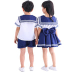 Girls' sailor Halloween costume with white top, navy striped sailor collar and navy swing skirt - view 5