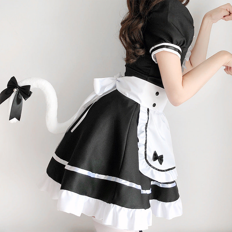 Women's black and white maid Halloween costume with ruffled apron, puff sleeves and headpiece - view 3