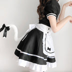 Women's black and white maid Halloween costume with ruffled apron, puff sleeves and headpiece - view 3