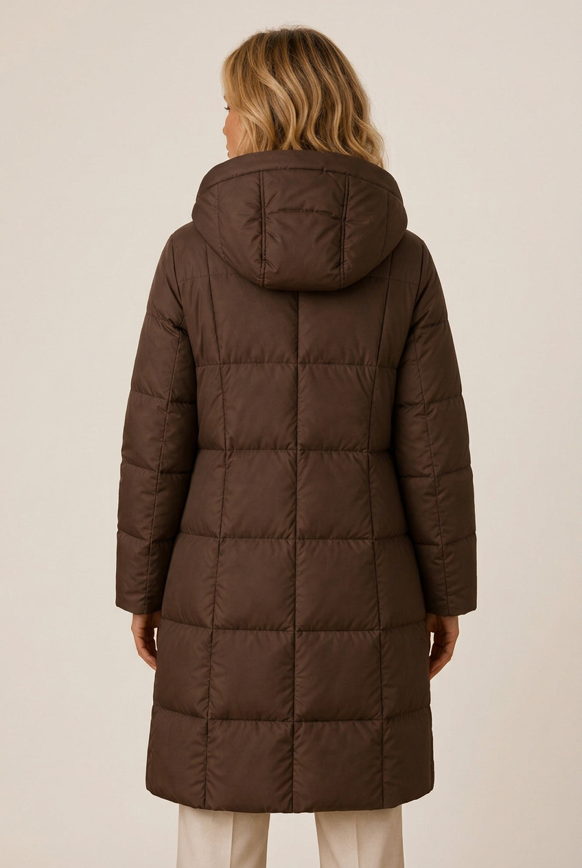Longline quilted puffer jacket with hood and side pockets on model - view 3