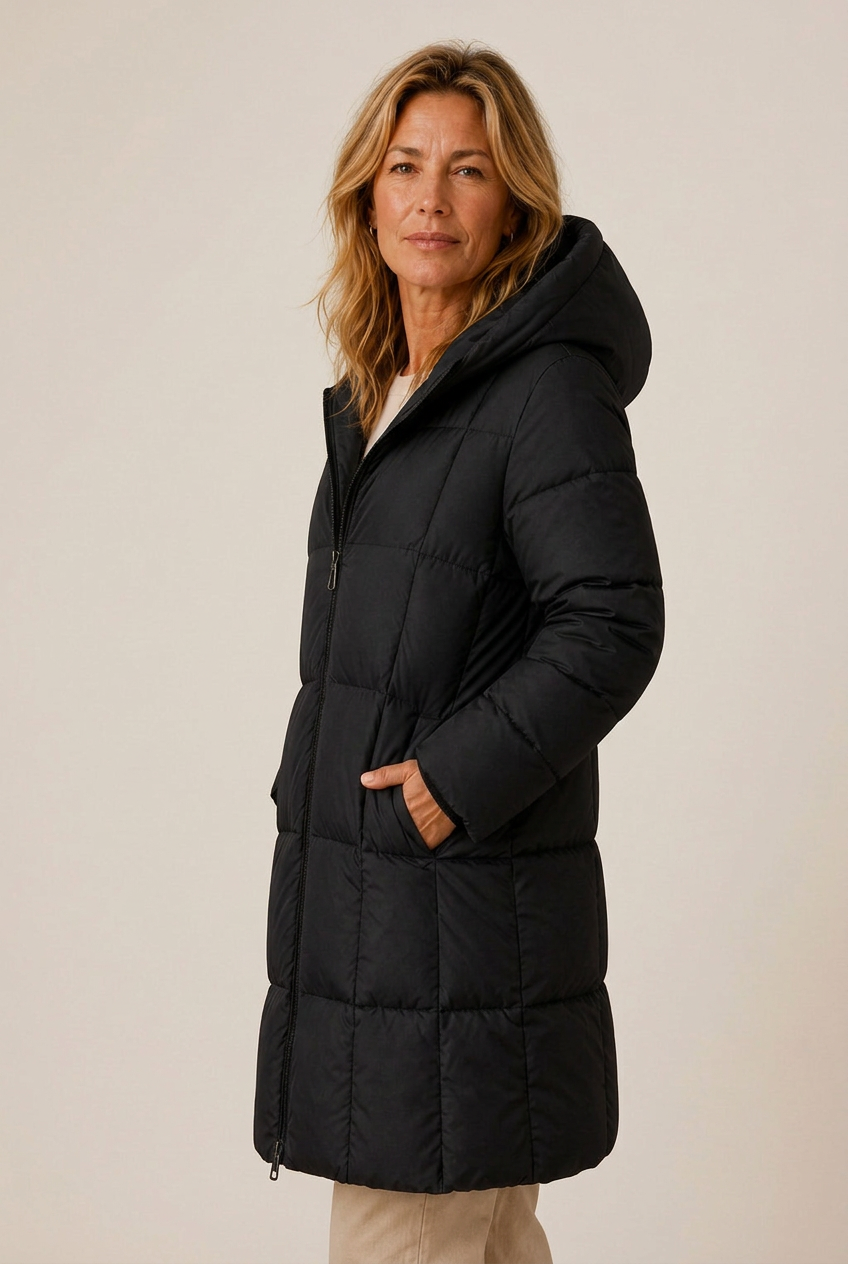 Longline quilted puffer jacket with hood and side pockets on model - view 5