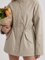 Khaki zip up utility jacket with funnel collar and cinched drawstring waist - view 6