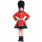 Girl wearing a red royal guard Halloween costume with gold trim, white belt, black skirt and tall black faux fur hat - view 5
